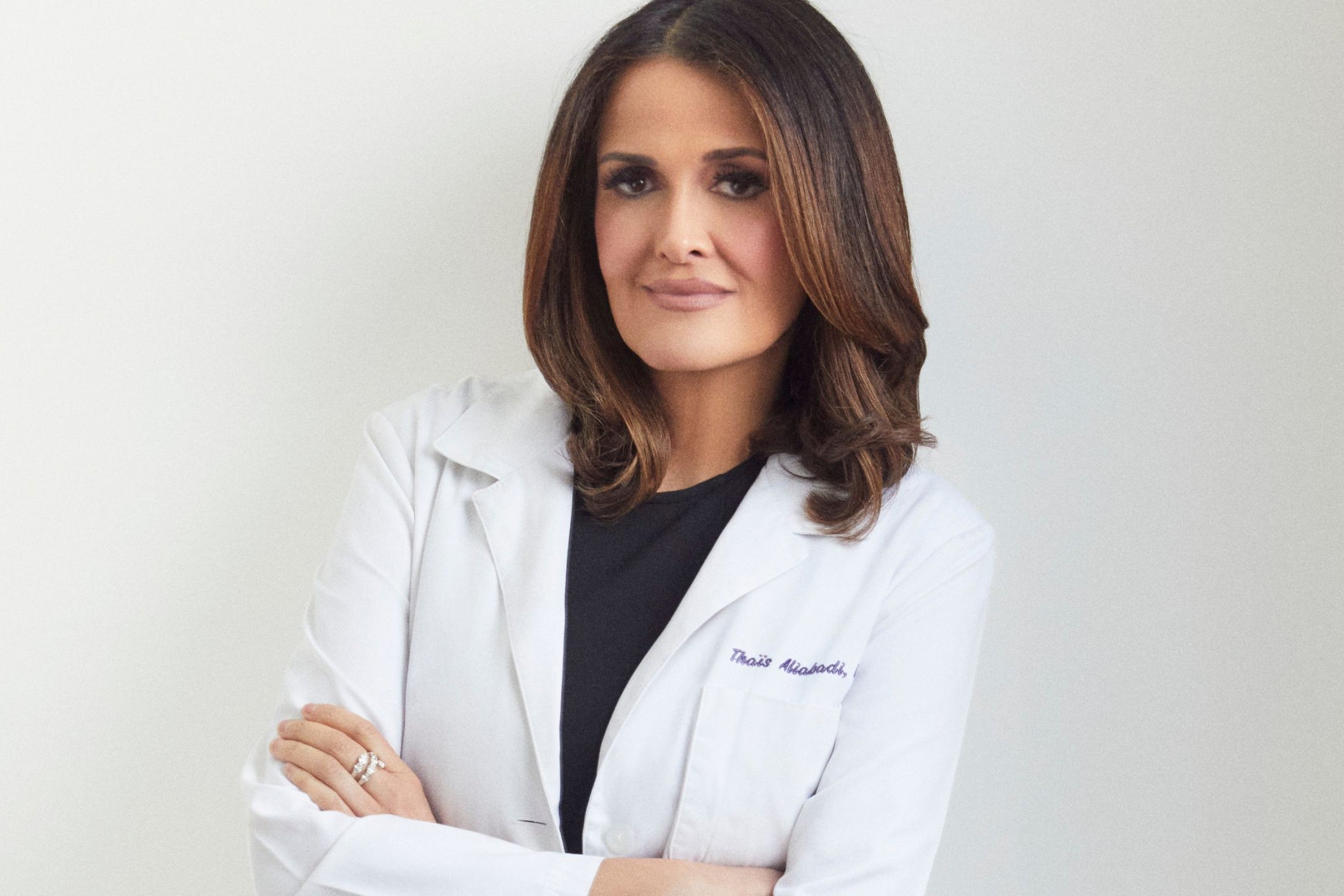 Portrait of Dr. Aliabadi, a medical professional specializing in women's health, with a focus on PCOS treatment and management. Dr. Aliabadi is shown in a clinical setting, offering guidance on how supplements can help manage PCOS symptoms such as hormonal imbalances, insulin resistance, and irregular cycles. As an expert in the field, Dr. Aliabadi often recommends various PCOS supplements to support overall health and improve quality of life for those living with polycystic ovary syndrome (PCOS)."